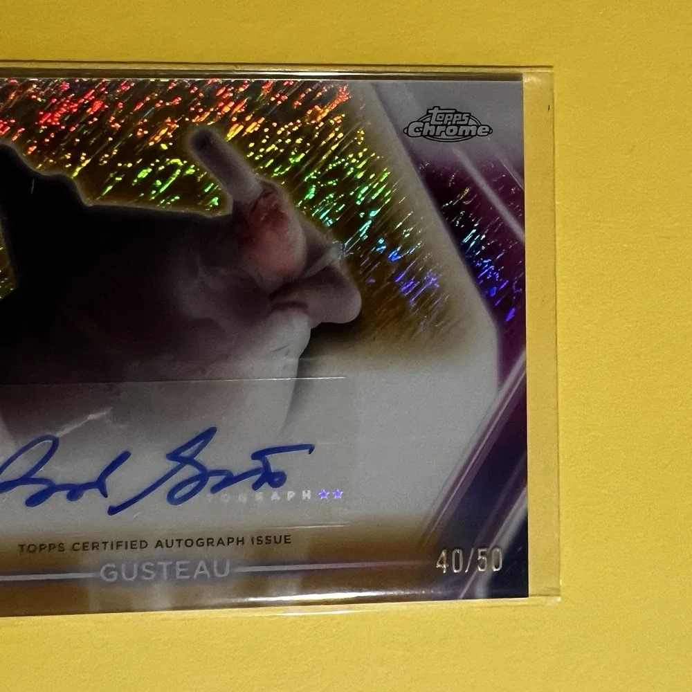 2026 Topps Disney Neon‎ Etch Auto Gold Shimmer #CNABG Brad Garrett Gusteau /50